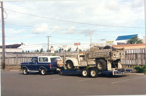 Historical2.jpg (58709 bytes)></a>

              <p>Third photo: Rick's tow vehicle and custom trailer loaded with the LRDG truck (Big Bear meet spring 1997).</p>
            </div>

          <hr>
          <div>
            <a href=